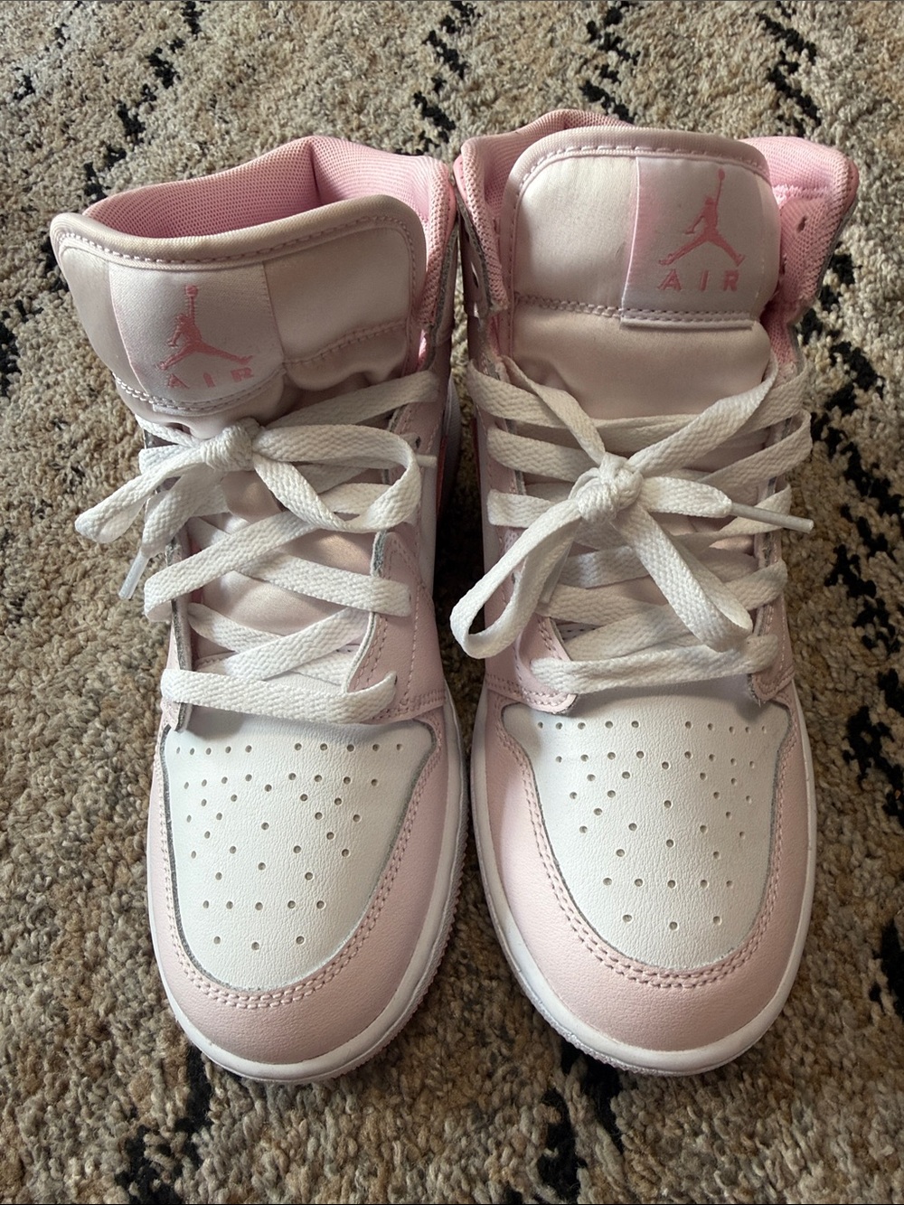 Jordan Women’s High-Top Sneakers in Pink and White